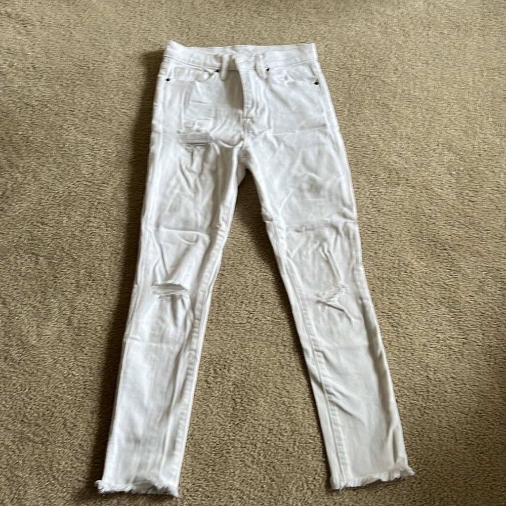 Skinny white distressed jeans